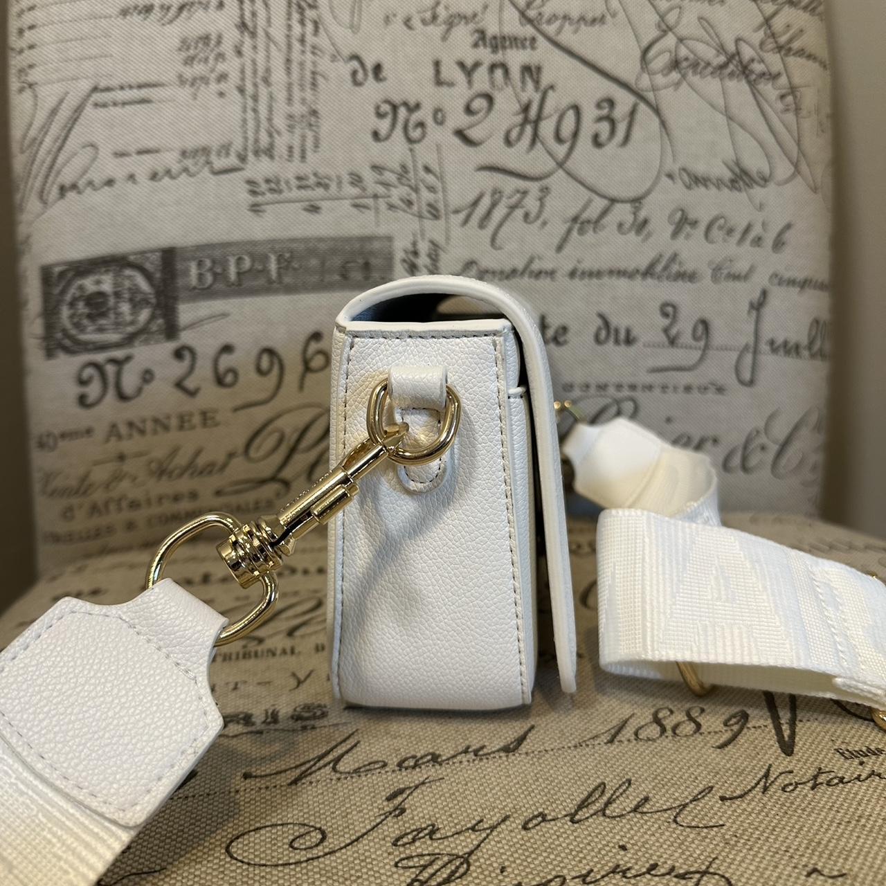 Marc Jacob’s The Mini Leather Shoulder bag in Crème White