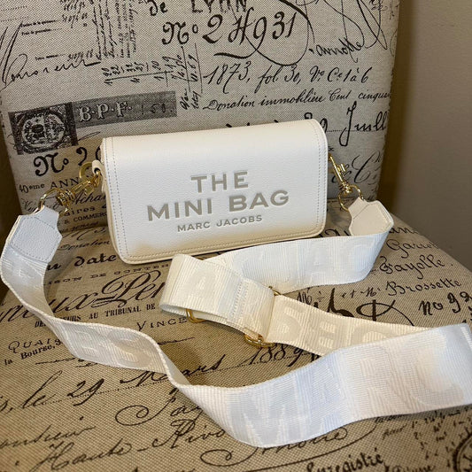 Marc Jacob’s The Mini Leather Shoulder bag in Crème White